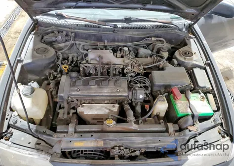 1997 Toyota Corolla Base из США, поврежденный, VIN 2T1BA02E5VC183598